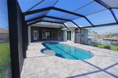 **Exceptional Waterfront Home in PGI with Spectacular Canal on Saint Andrews South Golf Club in Florida - for sale on GolfHomes.com, golf home, golf lot