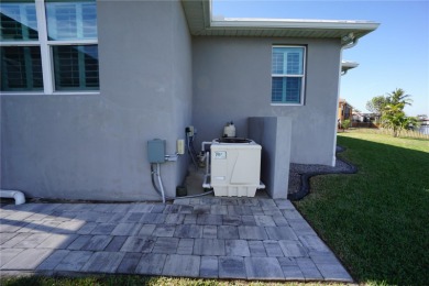 **Exceptional Waterfront Home in PGI with Spectacular Canal on Saint Andrews South Golf Club in Florida - for sale on GolfHomes.com, golf home, golf lot