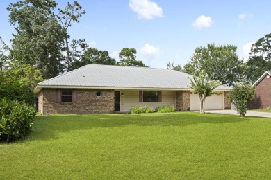 Lakefront Living... Welcome home to this 3BD / 2BA with separate on Pine Creek Golf Club in Mississippi - for sale on GolfHomes.com, golf home, golf lot