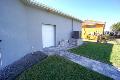 **Exceptional Waterfront Home in PGI with Spectacular Canal on Saint Andrews South Golf Club in Florida - for sale on GolfHomes.com, golf home, golf lot