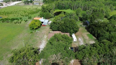Peaceful Country Setting with City Access - Osteen, FL . This on Cypress Point RV Golf Club in Florida - for sale on GolfHomes.com, golf home, golf lot