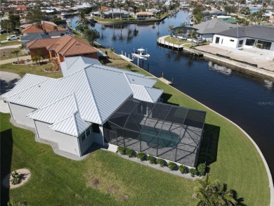 **Exceptional Waterfront Home in PGI with Spectacular Canal on Saint Andrews South Golf Club in Florida - for sale on GolfHomes.com, golf home, golf lot
