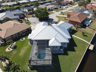 **Exceptional Waterfront Home in PGI with Spectacular Canal on Saint Andrews South Golf Club in Florida - for sale on GolfHomes.com, golf home, golf lot