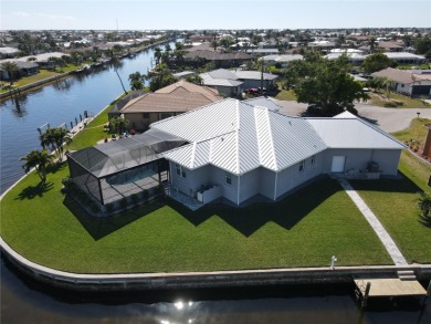 **Exceptional Waterfront Home in PGI with Spectacular Canal on Saint Andrews South Golf Club in Florida - for sale on GolfHomes.com, golf home, golf lot