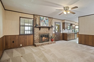 Lakefront Living... Welcome home to this 3BD / 2BA with separate on Pine Creek Golf Club in Mississippi - for sale on GolfHomes.com, golf home, golf lot