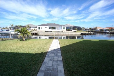 **Exceptional Waterfront Home in PGI with Spectacular Canal on Saint Andrews South Golf Club in Florida - for sale on GolfHomes.com, golf home, golf lot