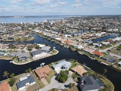 **Exceptional Waterfront Home in PGI with Spectacular Canal on Saint Andrews South Golf Club in Florida - for sale on GolfHomes.com, golf home, golf lot