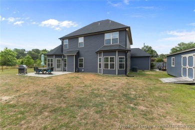 Welcome to your dream home! Nestled on nearly half an acre (.46) on Cypress Lakes Golf Course in North Carolina - for sale on GolfHomes.com, golf home, golf lot