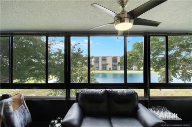 Move in ready! Spacious 2 bed, 2 bath, top floor condo in on Marina Lakes Golf Course in Florida - for sale on GolfHomes.com, golf home, golf lot