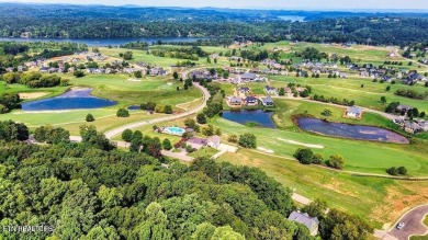 Take advantage of this amazing view and gorgeous sunsets in TN on Tennessee National Golf Club in Tennessee - for sale on GolfHomes.com, golf home, golf lot