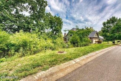 Take advantage of this amazing view and gorgeous sunsets in TN on Tennessee National Golf Club in Tennessee - for sale on GolfHomes.com, golf home, golf lot