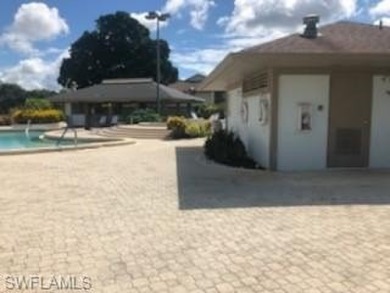 Light-filled, peaceful, 3/2 SECOND floor END-UNIT condo on Bentley Village Golf Course in Florida - for sale on GolfHomes.com, golf home, golf lot