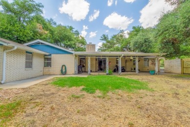 Beautifully updated home on a spacious corner lot, conveniently on Sammons Golf Links in Texas - for sale on GolfHomes.com, golf home, golf lot