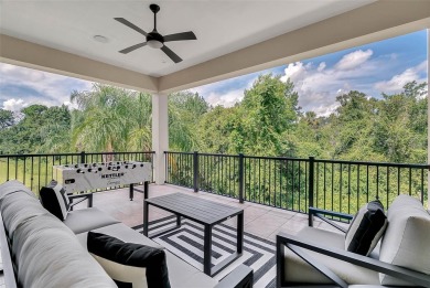 Completely refreshed contemporary style home with Spanish tile on Reunion Resort Golf Course in Florida - for sale on GolfHomes.com, golf home, golf lot