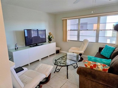 ITS ALL ABOUT THE LANAI & THE VIEWS IN THIS Bright and inviting on Hillsboro Pines Golf in Florida - for sale on GolfHomes.com, golf home, golf lot