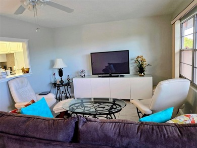 ITS ALL ABOUT THE LANAI & THE VIEWS IN THIS Bright and inviting on Hillsboro Pines Golf in Florida - for sale on GolfHomes.com, golf home, golf lot