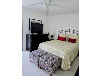 Bright and inviting 1-bedroom, 1.5-bath condo located in the on Hillsboro Pines Golf in Florida - for sale on GolfHomes.com, golf home, golf lot