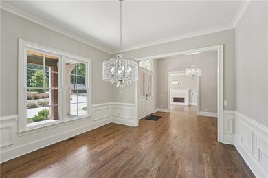 Set on one of the rarest golf-course placements in Governors on The Governors Towne Club in Georgia - for sale on GolfHomes.com, golf home, golf lot