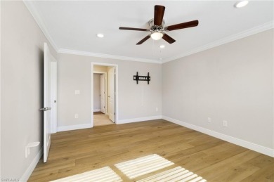 Discover refined luxury within the contemporary ambiance of this on Old Corkscrew Golf Club in Florida - for sale on GolfHomes.com, golf home, golf lot