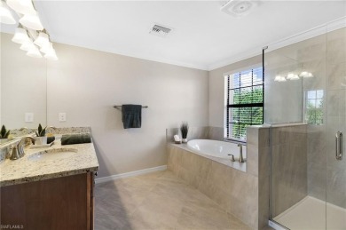 Discover refined luxury within the contemporary ambiance of this on Old Corkscrew Golf Club in Florida - for sale on GolfHomes.com, golf home, golf lot