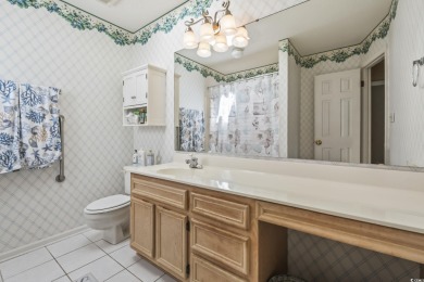 Step inside this charming, meticulously maintained 3-bedroom on Pine Lakes Country Club in South Carolina - for sale on GolfHomes.com, golf home, golf lot