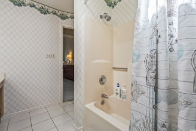 Step inside this charming, meticulously maintained 3-bedroom on Pine Lakes Country Club in South Carolina - for sale on GolfHomes.com, golf home, golf lot