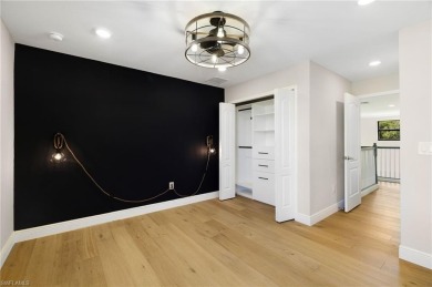 Discover refined luxury within the contemporary ambiance of this on Old Corkscrew Golf Club in Florida - for sale on GolfHomes.com, golf home, golf lot