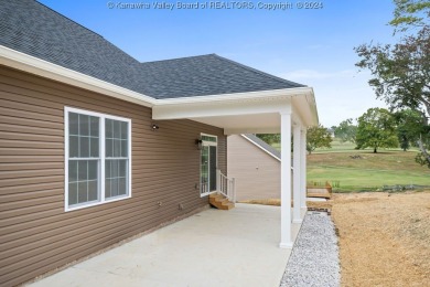 NEW CONSTRUCTION - Boast spacious room sizes and fantastic on Little Creek Country Club in West Virginia - for sale on GolfHomes.com, golf home, golf lot