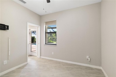 Discover refined luxury within the contemporary ambiance of this on Old Corkscrew Golf Club in Florida - for sale on GolfHomes.com, golf home, golf lot