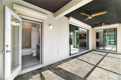 Discover refined luxury within the contemporary ambiance of this on Old Corkscrew Golf Club in Florida - for sale on GolfHomes.com, golf home, golf lot