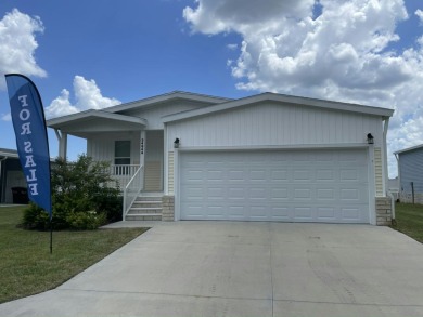 Garage homes are rare in Age Qualified 55+ Crystal Lake on The Links of Lake Bernadette in Florida - for sale on GolfHomes.com, golf home, golf lot
