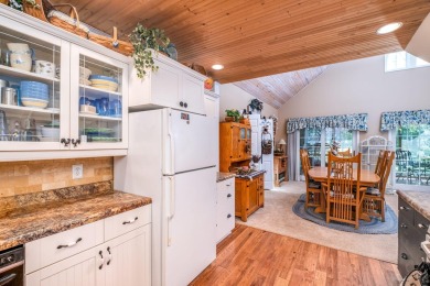 Charming Country Cottage with Modern Comforts and Serene Privacy on Canadian Lakes Country Club-The Royal Course in Michigan - for sale on GolfHomes.com, golf home, golf lot