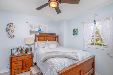 Charming Country Cottage with Modern Comforts and Serene Privacy on Canadian Lakes Country Club-The Royal Course in Michigan - for sale on GolfHomes.com, golf home, golf lot