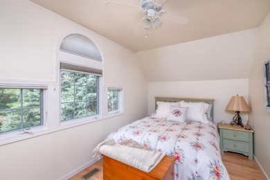 Charming Country Cottage with Modern Comforts and Serene Privacy on Canadian Lakes Country Club-The Royal Course in Michigan - for sale on GolfHomes.com, golf home, golf lot