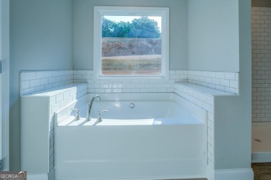 The Rachel Plan with unfinished basement - Builder will pay up on Turtle Cove Golf Course in Georgia - for sale on GolfHomes.com, golf home, golf lot
