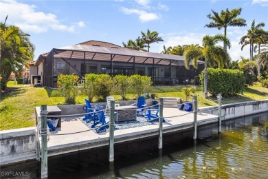 Paradise Found: Immaculate Waterfront Pool Home with TWO MASTER on Royal Tee Country Club in Florida - for sale on GolfHomes.com, golf home, golf lot