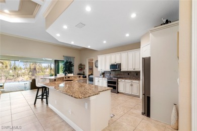 Paradise Found: Immaculate Waterfront Pool Home with TWO MASTER on Royal Tee Country Club in Florida - for sale on GolfHomes.com, golf home, golf lot