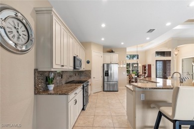 Paradise Found: Immaculate Waterfront Pool Home with TWO MASTER on Royal Tee Country Club in Florida - for sale on GolfHomes.com, golf home, golf lot