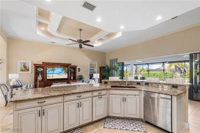 Paradise Found: Immaculate Waterfront Pool Home with TWO MASTER on Royal Tee Country Club in Florida - for sale on GolfHomes.com, golf home, golf lot