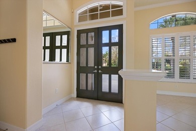 One or more photo(s) has been virtually staged. Tucked within on Boca Royale Golf and Country Club in Florida - for sale on GolfHomes.com, golf home, golf lot