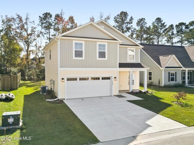Experience the brand new Belton plan, now available in Bell on Green Hills Golf Course in North Carolina - for sale on GolfHomes.com, golf home, golf lot