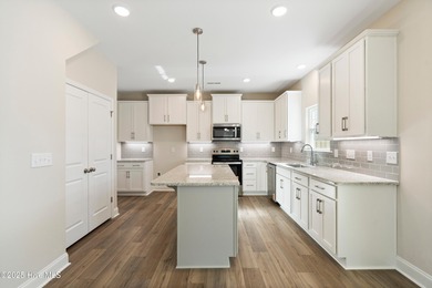 Experience the brand new Belton plan, now available in Bell on Green Hills Golf Course in North Carolina - for sale on GolfHomes.com, golf home, golf lot