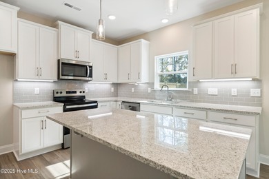 Experience the brand new Belton plan, now available in Bell on Green Hills Golf Course in North Carolina - for sale on GolfHomes.com, golf home, golf lot