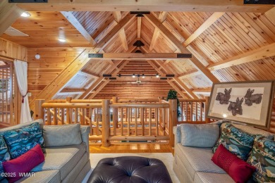 Discover the charm of this fully furnished tranquil log cabin on White Mountain Country Club in Arizona - for sale on GolfHomes.com, golf home, golf lot