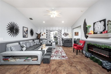 Experience the ultimate Florida lifestyle in this stunning home on Rotonda Golf and Country Club The Palms Course in Florida - for sale on GolfHomes.com, golf home, golf lot