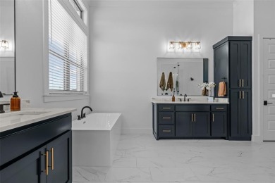 Experience true luxury in this breathtaking executive estate on The Golf Club at Resort Eagle Mountain Lake in Texas - for sale on GolfHomes.com, golf home, golf lot