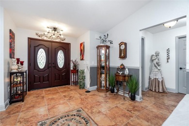Experience the ultimate Florida lifestyle in this stunning home on Rotonda Golf and Country Club The Palms Course in Florida - for sale on GolfHomes.com, golf home, golf lot