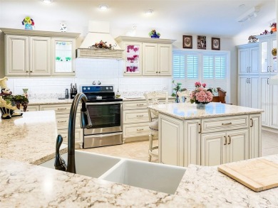 SHOW STOPPER! NOT a COOKIE CUTTER HOUSE; this house has on Bella Glade Country Club in Florida - for sale on GolfHomes.com, golf home, golf lot
