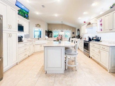 SHOW STOPPER! NOT a COOKIE CUTTER HOUSE; this house has on Bella Glade Country Club in Florida - for sale on GolfHomes.com, golf home, golf lot