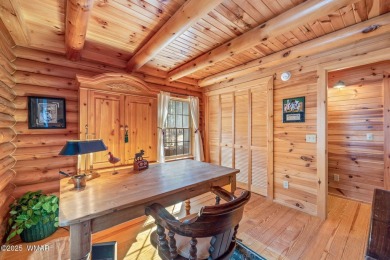 Discover the charm of this fully furnished tranquil log cabin on White Mountain Country Club in Arizona - for sale on GolfHomes.com, golf home, golf lot